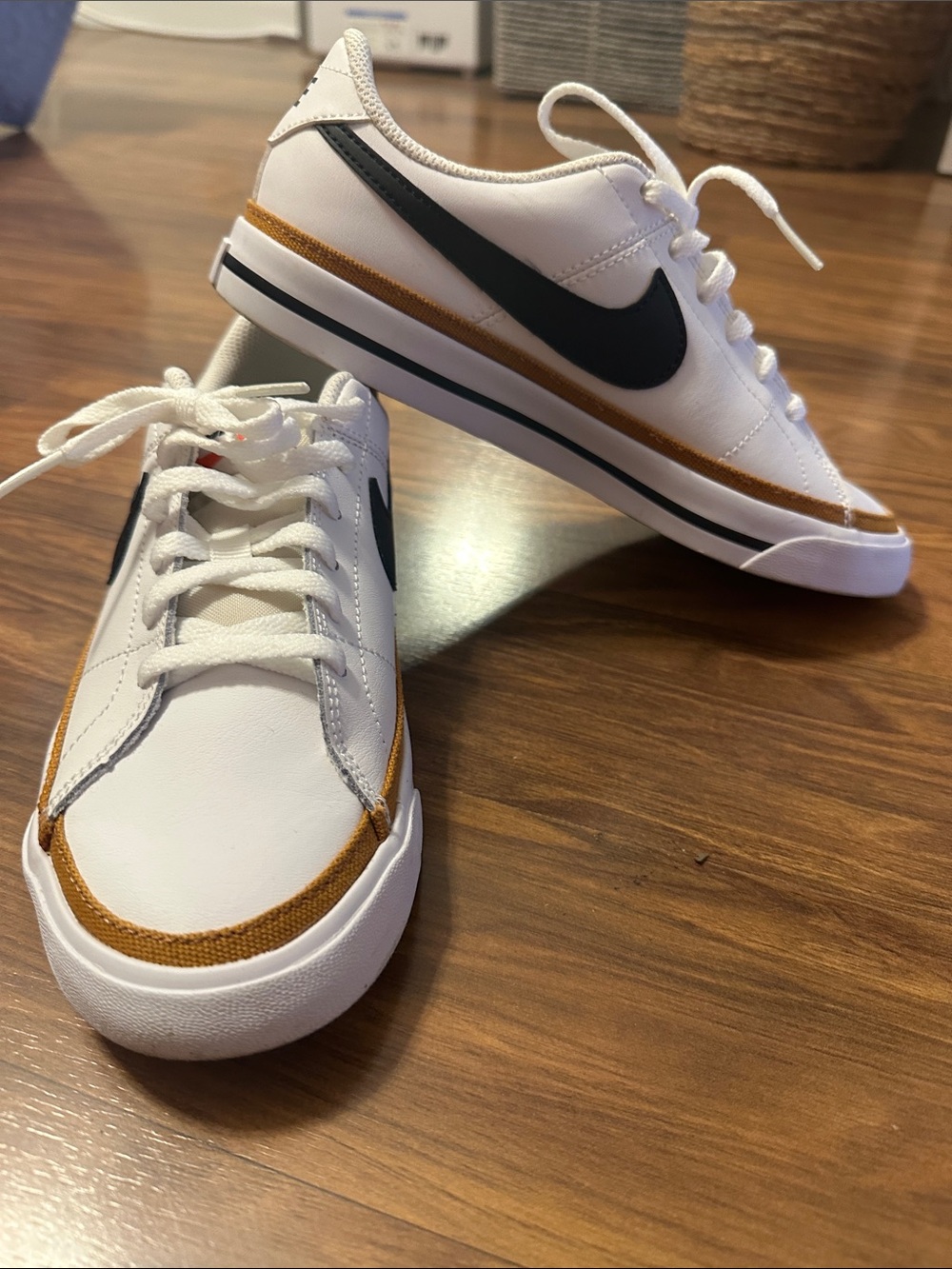 Nike Kid Low-Top Sneakers in White, Black & Gold